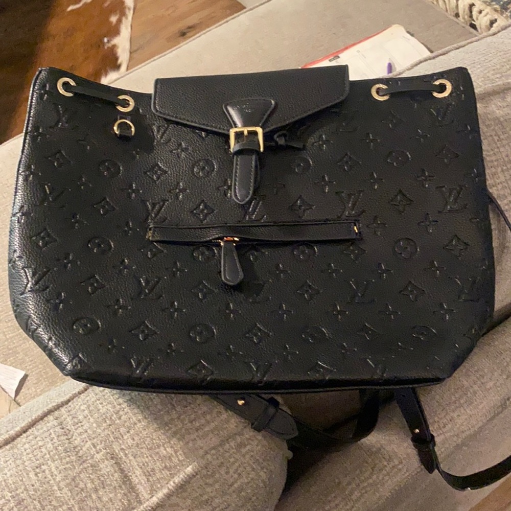 Black leather.  Brand new. Never carried.